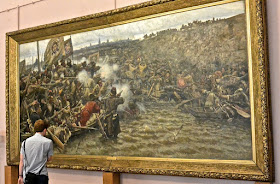 La conquête de la Sibérie par Yermak par Vassili Sourikov  Les Russes (à gauche) fusillent sans pitié avec leurs armes à feu attaquent leurs ennemis qui se défendent avec des arcs et des flèches. 