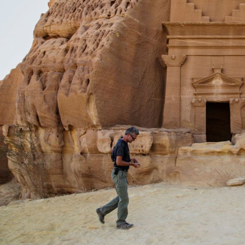 Paul Salopek wanders through the ancient ruins of Madain Salih in Saudi Arabia