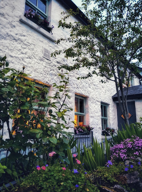 white gables restaurant image outside, flowers