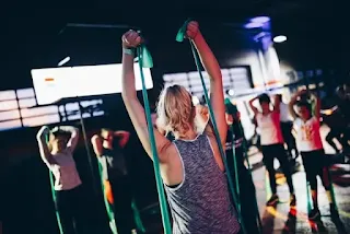 Girls doing resistance band exercise