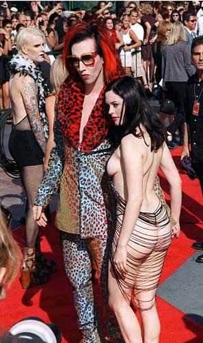 Then there's the inexplicable fact that Manson somehow gets all these hot 