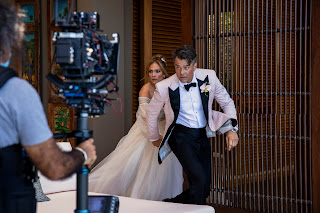 Jennifer Lopez as Darcy Rivera and Josh Duhamel as Tom Fowler in Shotgun Wedding.