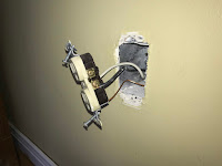 Outlet removed from the wall