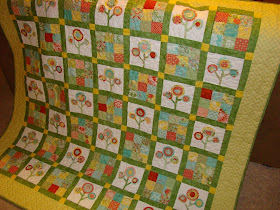 Bloom Where You Are Planted raw edge applique flower quilt