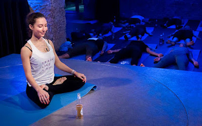 yoga teacher in beer and gin yoga