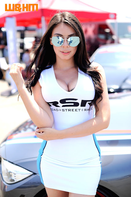 model Laura Diosa Giraldo in a white RSR Wheels mini dress 