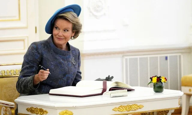 Queen Mathilde wore Armani Prive coat Fall 2021 Couture Collection. President Gitanas Nauseda and his wife Diana Nausediene