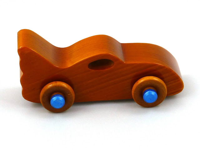 Handmade Wooden Toy Bat Car from the Play Pal Series Amber Shellac with Metalic Blue Trim