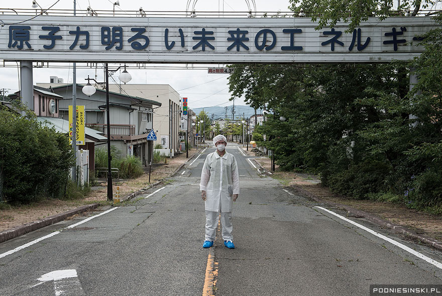 “Nuclear energy is the energy of a bright future” reads the sign - Never-Before-Seen Images Reveal How The Fukushima Exclusion Zone Was Swallowed By Nature