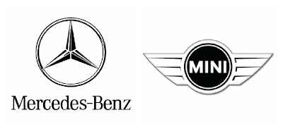 Photo of a black and white Mercedes-Benz logo and black and white Mini Cooper logo next to each other