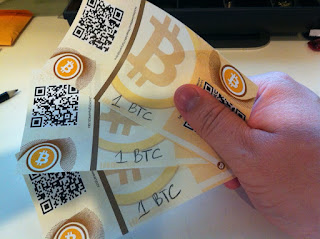 PaperWallet - source https://en.bitcoin.it/wiki/File:FirstBitcoinBills.jpg