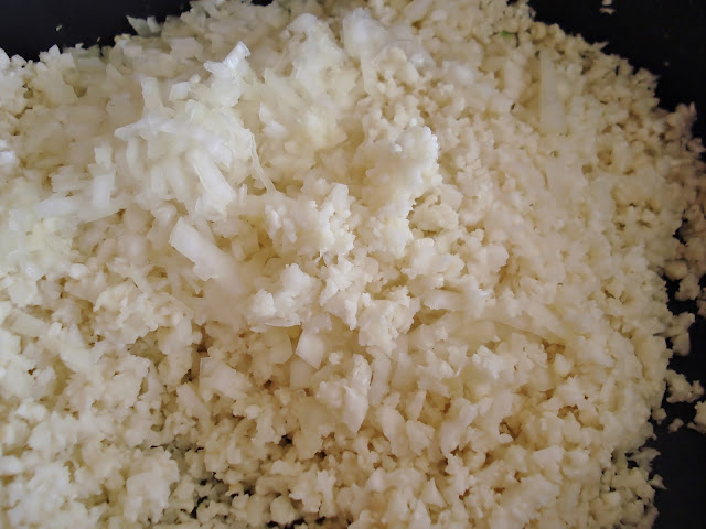 Cook the cauliflower rice in a deep pan