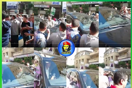 بالصور:مواطنون  يحاولون الإعتداء على محافظ الاسكندرية  بعد غرق المحافظة (30صورة)