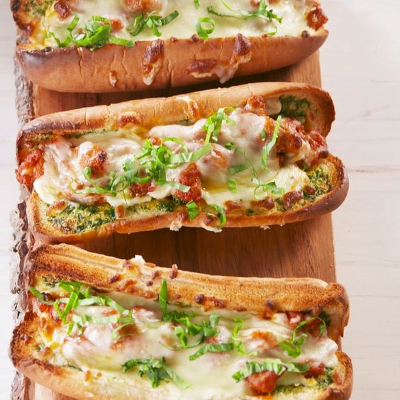  Garlic Butter Sausage Subs from Delish.com will satisfy your lunch hunger pangs.