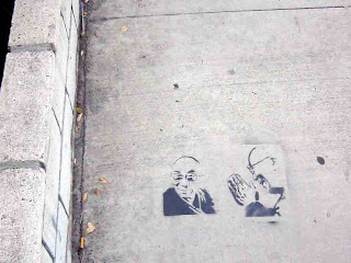 Someone spray painted this on the sidewalk (c) David Ocker