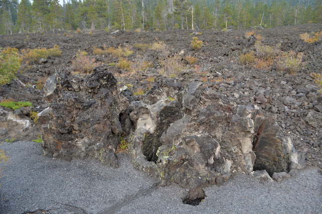 three holes along the side of the path