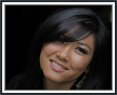 Closeup of young woman smiling, Toronto portrait photographer Robert Rafton