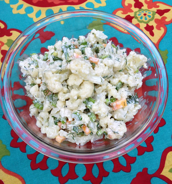 glass bowl filled with cauliflower salad