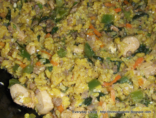 photo of chicken with sausage,brown rice, vegetables, and spinach