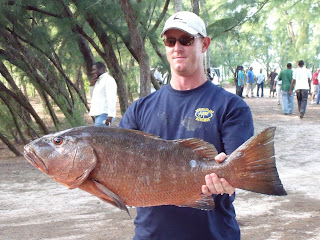 it took a while for this pic to get emailed to eric, but he's proud of his catch.