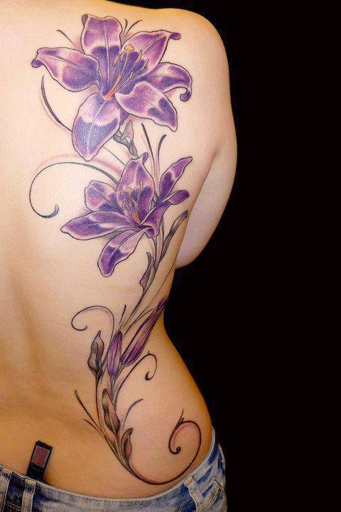  Adorable realistic purple flower tattoo on back   