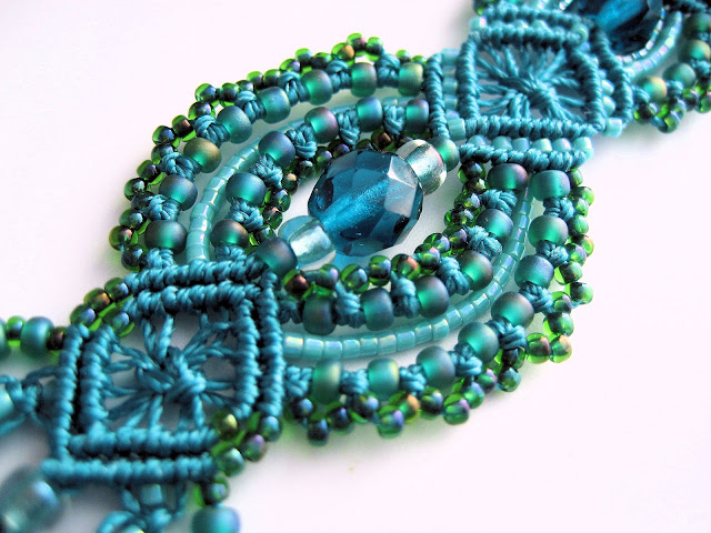 Close up of rounded diamond component in teal micro macrame bracelet by Sherri Stokey