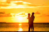 Couple Standing in the Seashore Hugging