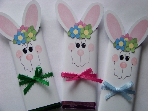 cute easter bunny pictures to color. These cute Easter bunnies hold