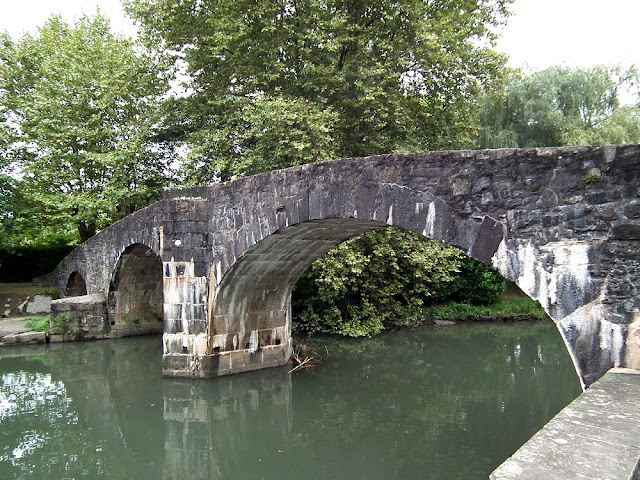 Roman bridge over the Nivelle at Ascain. Pyrenees-Atlantiques. France. Photographed by Susan Walter. Tour the Loire Valley with a classic car and a private guide.