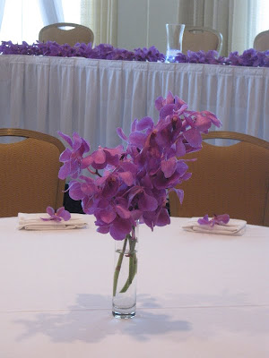 For the centerpieces the bride wanted purple elegant and budgetfriendly