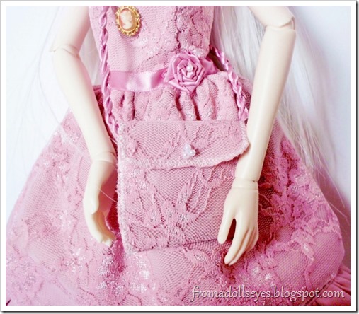 Pink lace doll purse to match the dress.