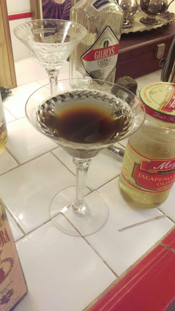 Gin, vermouth and too much balsamic vinegar.