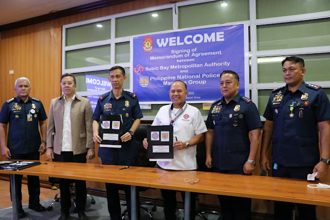 SBMA Chairman and Administrator Rolen C. Paulino (4th from left) and Police Brigadier General Harold B. Tuzon (3rd from left), PNP Maritime Group director present the Memorandum of Agreement signed during a ceremony held at the SBMA Boardroom Wednesday (March 30).