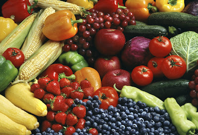 A collection of fresh fruit and uncooked vegetables