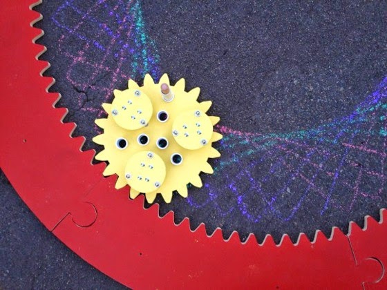 Giant Spirograph Makes Mathematically Perfect Chalk Drawings On The Street via Make