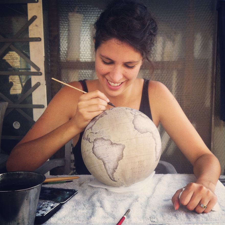 Smiles.. working on the terrace on a summers day - One Of The World’s Last Remaining Globe-Makers That Use The Ancient Art Of Making Globes By Hand