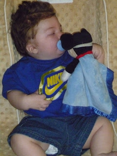 baby mason with mickey mouse lovey