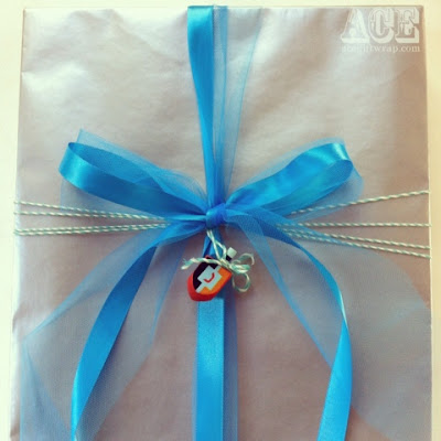 gift with dreidel by Ace Gift Wrapping Service