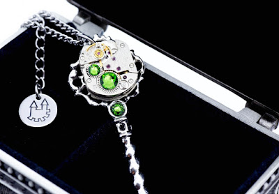 http://www.myclockworkcastle.co.uk/product/ornate-bejewelled-clockwork-key-pendant