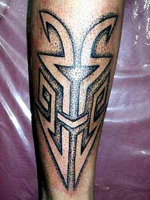 As a wife of a Sikerei she must have Titi (Mentawai tattoo motives).
