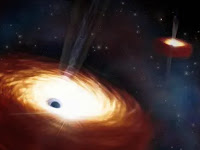 Heaviest pair of black holes ever seen weighs 28 billion times more than the sun.