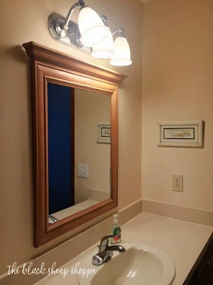 Mis-matched vanity mirror.