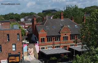 Photo of Taylor Swift Mural and Anfield Stadium