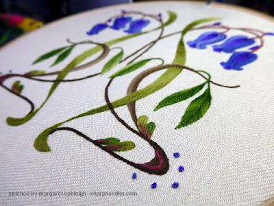 Finished off the crewel bluebells: French knots added in purple around curves at bottom
