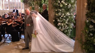 Prince Charles walked Meghan on the aisle