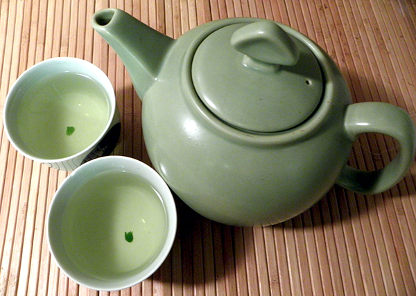 Mint Tea in Pot and Poured into Two Teacups