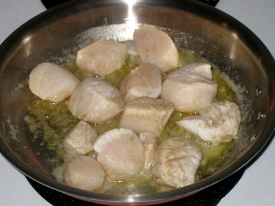 Sauté scallops in melted butter