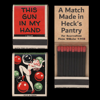 Three views of the same design of matchbook on black background. Front view of matchbook is red background with black lettering that reads "THIS GUN IN MY HAND." Back of matchbook has simple line drawing of dancing woman in red high heels, red panties and red bra (maybe?) with red hair. Green, red and transparent bubbles surround her. Open view of matchbook says "A Match Made in Heck's Pantry. For Reservations Phone WEbster 9-9452" inside.