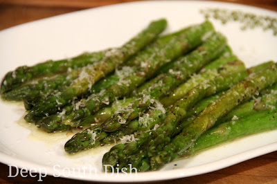 Fresh asparagus prepared by butter steaming in a skillet.