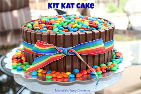 beautiful KitKat cake with a rainbow ribbon